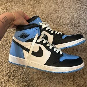 NWOT nike university blue jordan’s